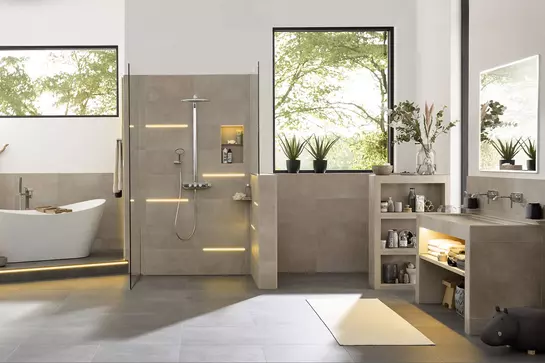 Beige bathroom featuring a selection of Schl&uuml;ter products including KERDI-BOARD-W and LIPROTEC.