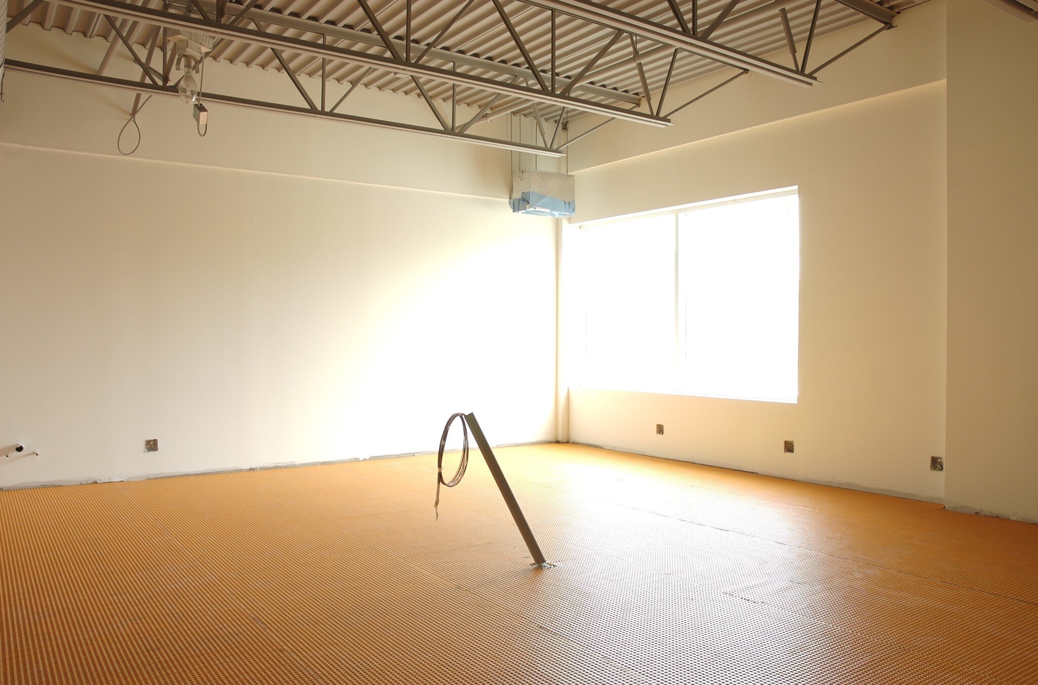 Schluter-DITRA is installed during the construction phase of Schluter's Canadian headquarters in Montreal.