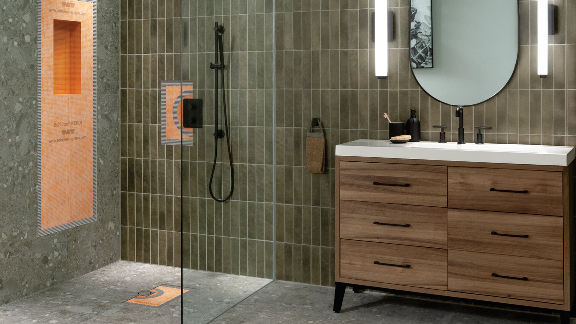 Commercial tiled shower with bonded waterproof membrane and bonding flange installation
