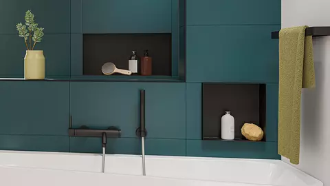 Installed flush with the wall or protruding from it, matt black-coated design niches in a modern bathroom
