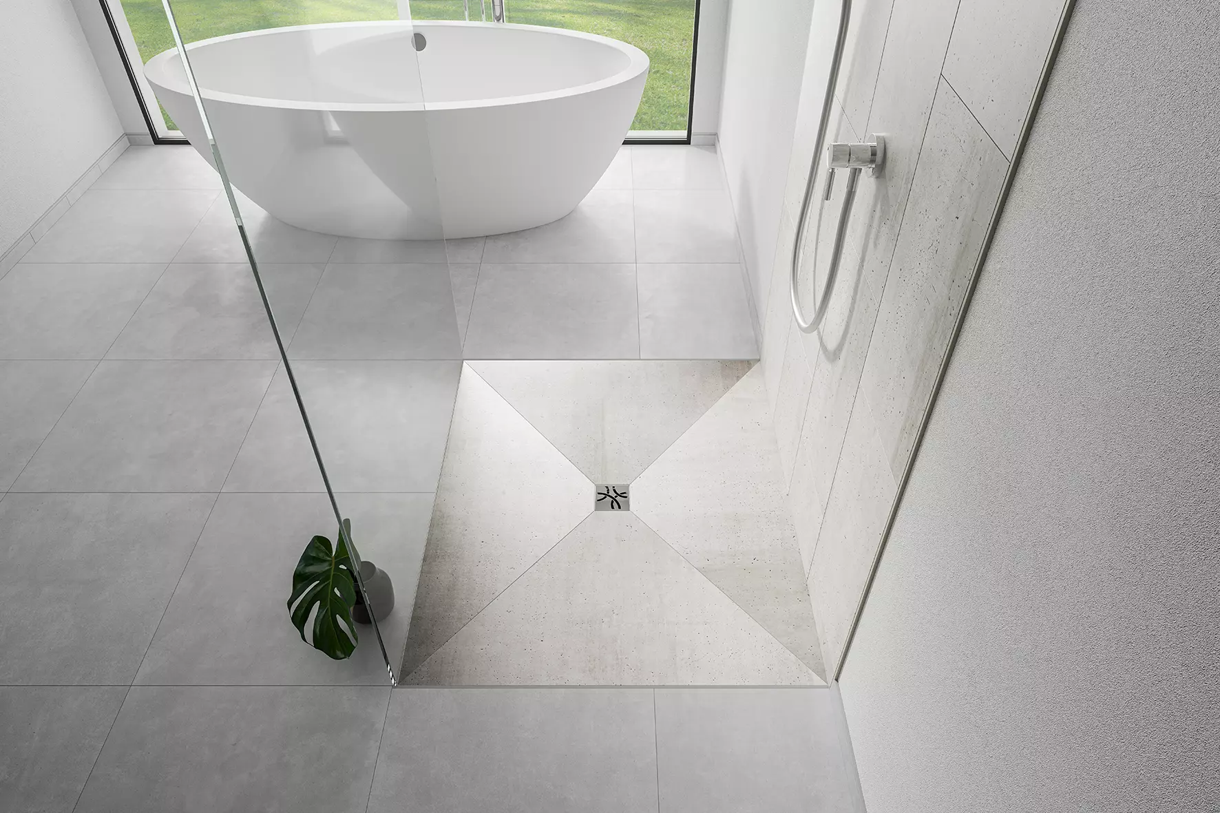 Salle de bains avec baignoire sur pieds et douche accessible avec &eacute;vacuation KERDI-DRAIN.