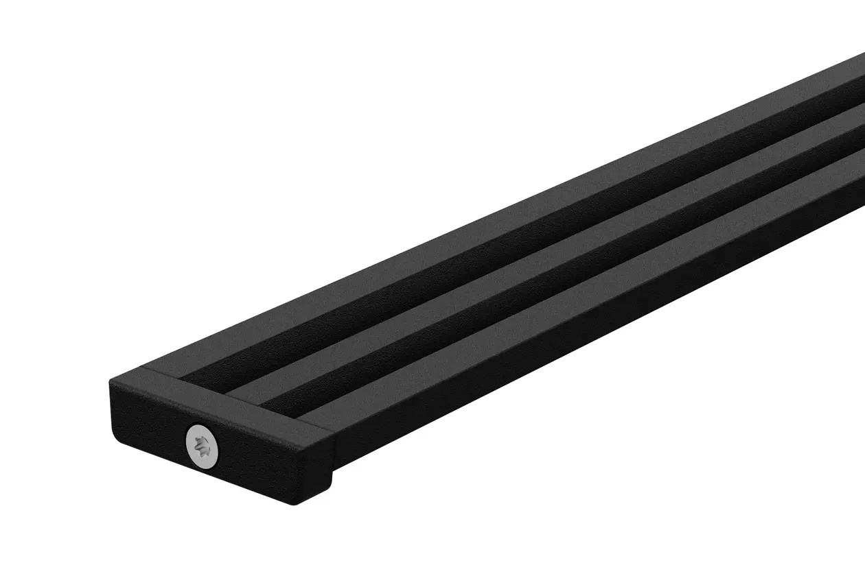 Produktn&auml;rbild p&aring; avloppsprofilen KERDI-LINE-VARIO WAVE med TRENDLINE-bel&auml;ggningen MGS grafitsvart matt mot vit bakgrund