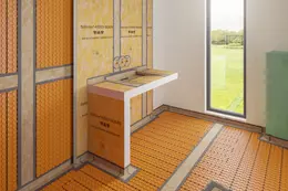 Sous-construction termin&eacute;e dans une salle de bains avec lavabo accessible en fauteuil roulant, chauffage mural et au sol