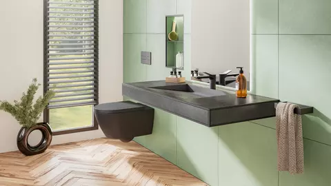 Free floating, grey tiled vanity unit made of KERDI-BOARD-WS with standard fittings and matt black profile finish