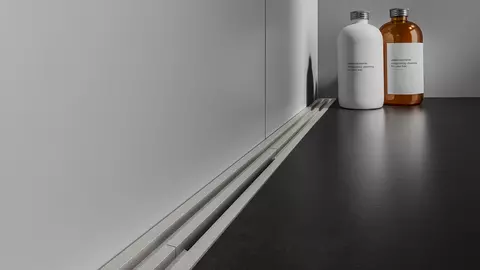 Floor-level shower with length-variable Schl&uuml;ter-KERDI-LINE-VARIO shower channel in WAVE design