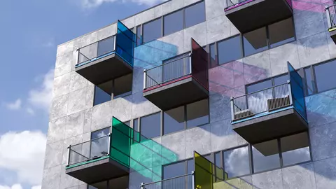 Fachada exterior de un edificio con perfiles vierteaguas de colores