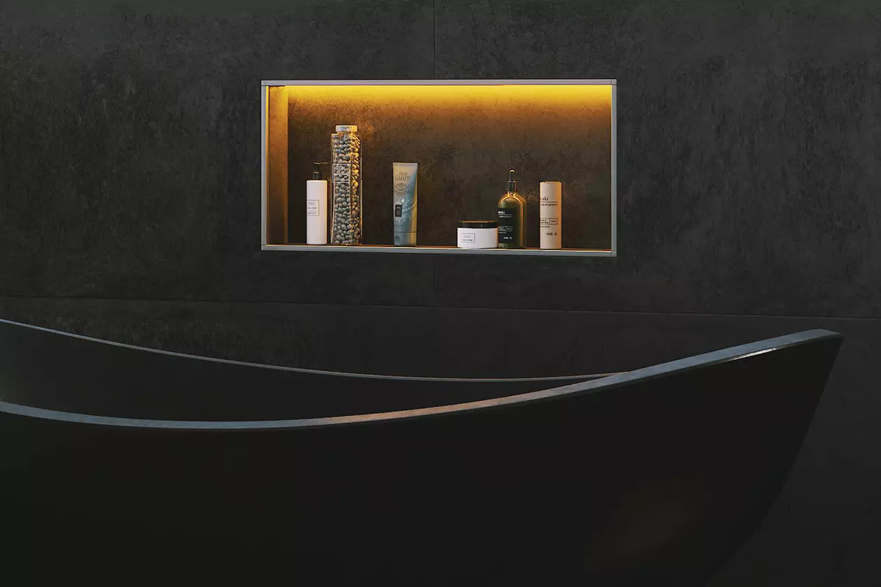 Salle de bains sombre avec baignoire et une niche murale &eacute;clair&eacute;e Schl&uuml;ter-KERDI-BOARD-NLT.