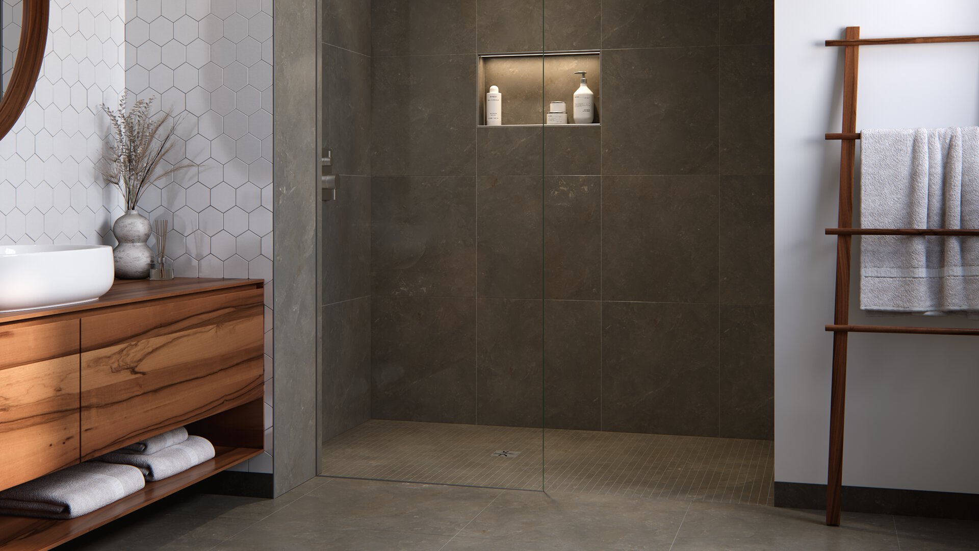 Finished curbless shower with Schluter KERDI-DRAIN point drain, dark stone-look wall tile and illuminated niche