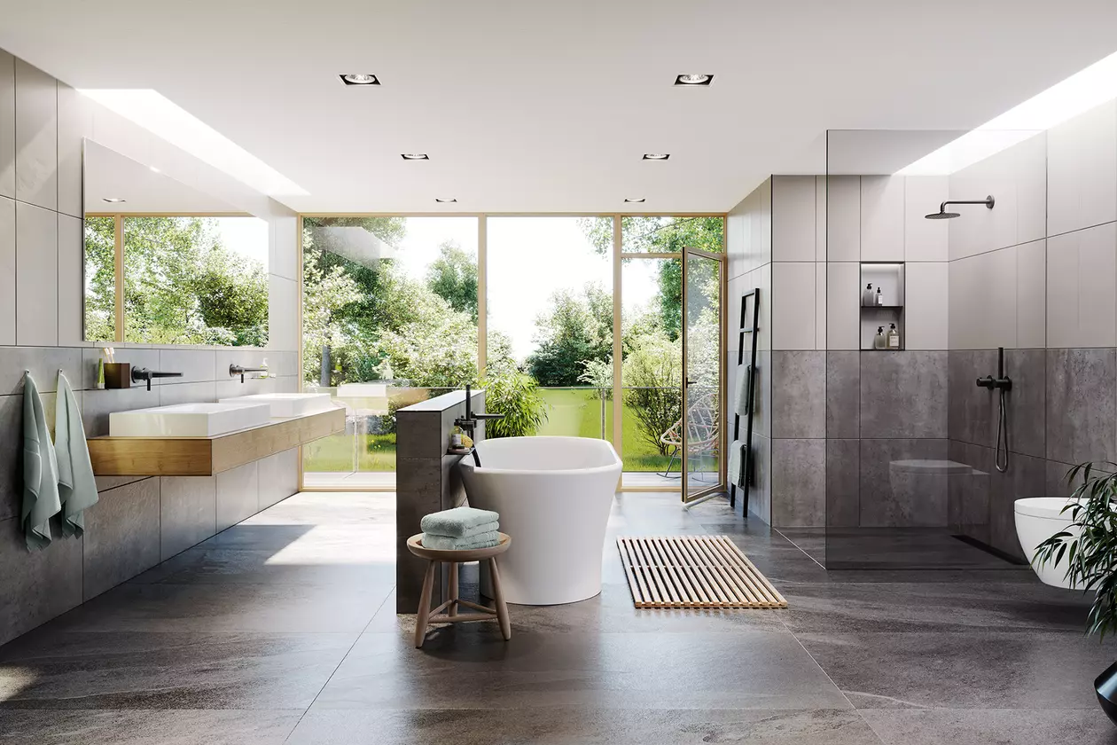 Grande salle de bains avec baignoire &icirc;lot au centre, douche &agrave; l’italienne et double vasque